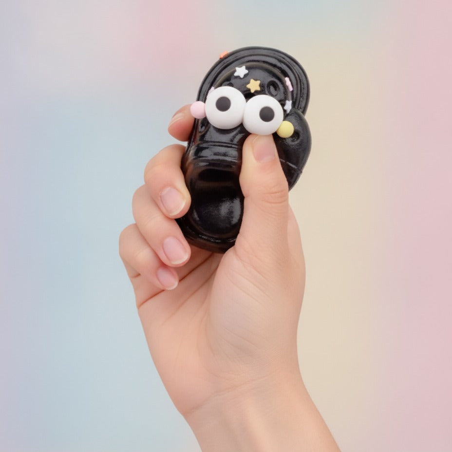 Black Squishy With Star Charm Accessories - squeeze in hand