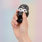 Black Squishy With Star Charm Accessories - squeeze in hand