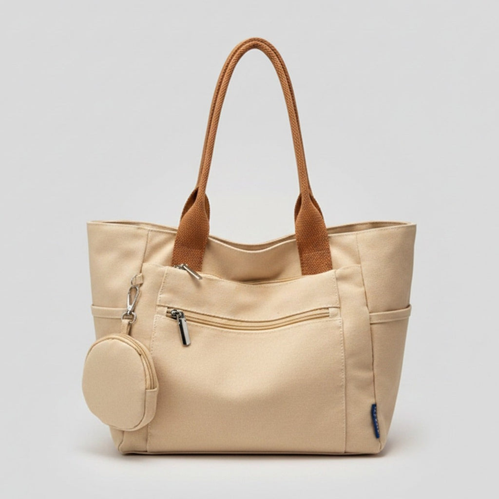 Cream Canvas Tote Bag With Circular Charm – bags & wallets (view 1)