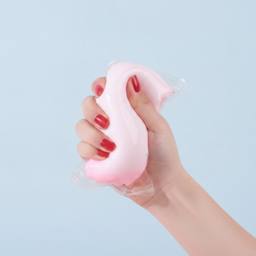 Squishy Sensory Ball Toy - Pink - squeeze in hand