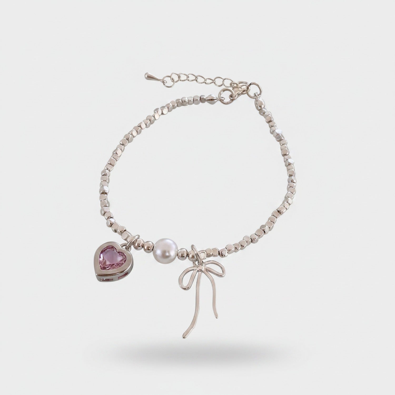Silver Heart Charm Beaded Bracelet With Pearl And Bow