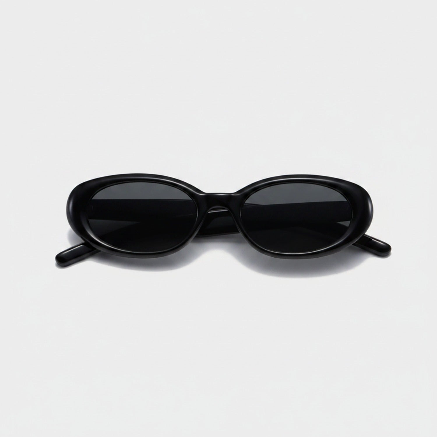 Black Oval Sunglasses with Dark Tinted Lenses