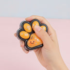 Halloween Paw Squishy - Halloween Orange - squeeze in hand