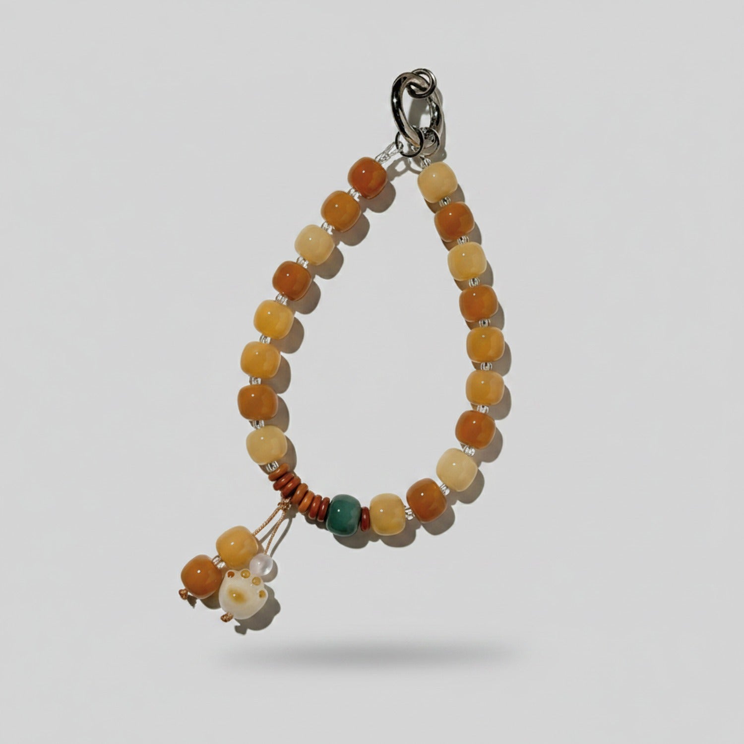 Amber Beaded Phone Charm With Tassel Strap