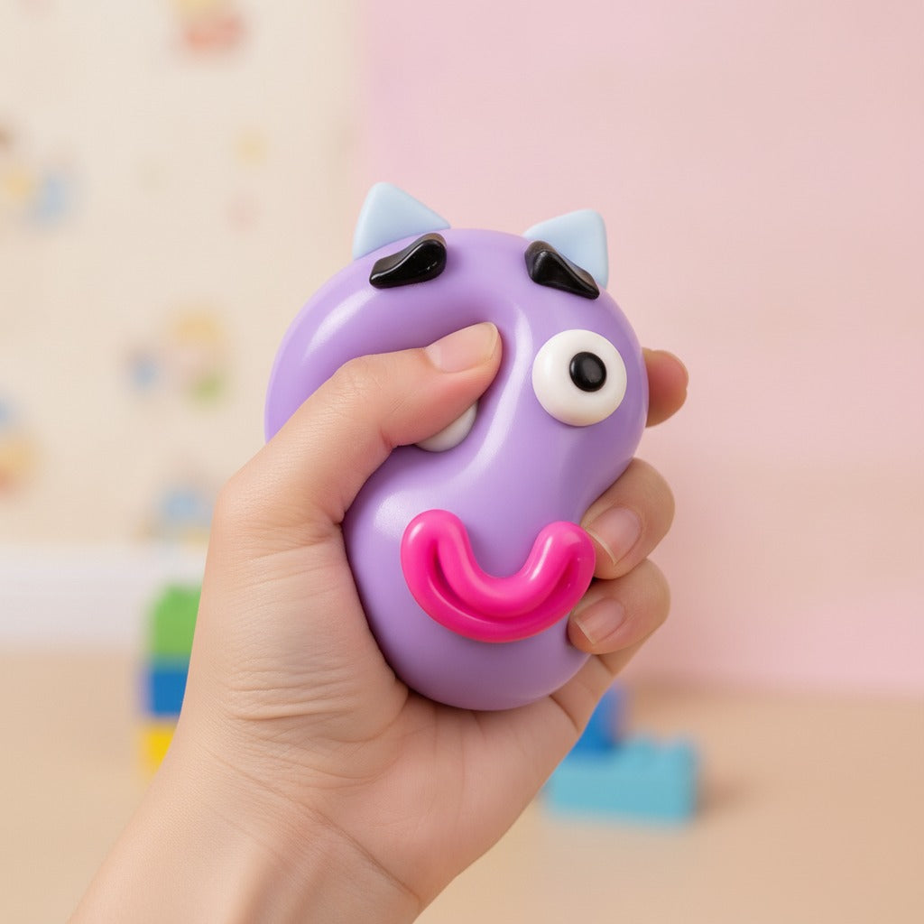 Squishy Pup Stress Ball - Yellow - squeeze in hand