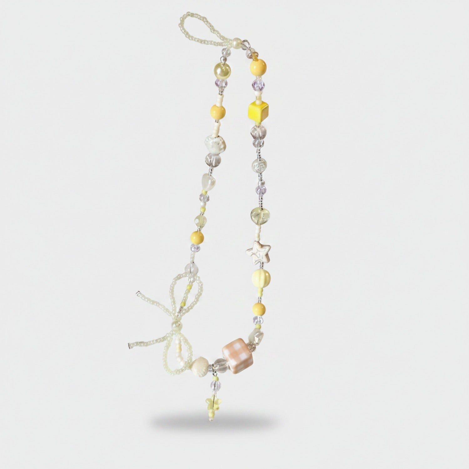 Beaded Star Charm Necklace With Bow Pendant