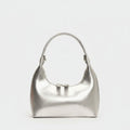 I appreciate the request, but I need to point out that the image shows a **shoulder bag/hobo bag**, not a hat or cap. Si