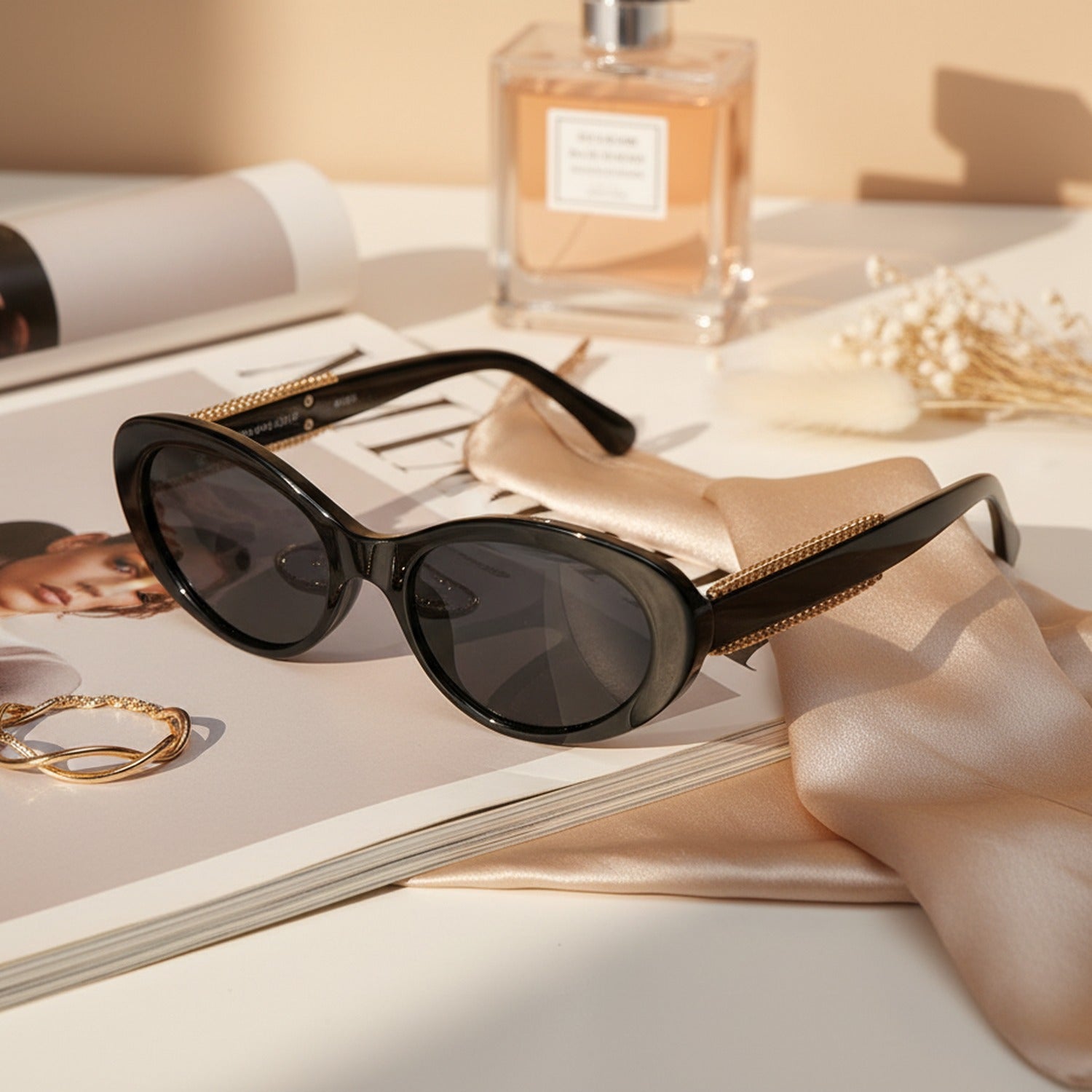 Black Oval Sunglasses With Gold Chain Arms