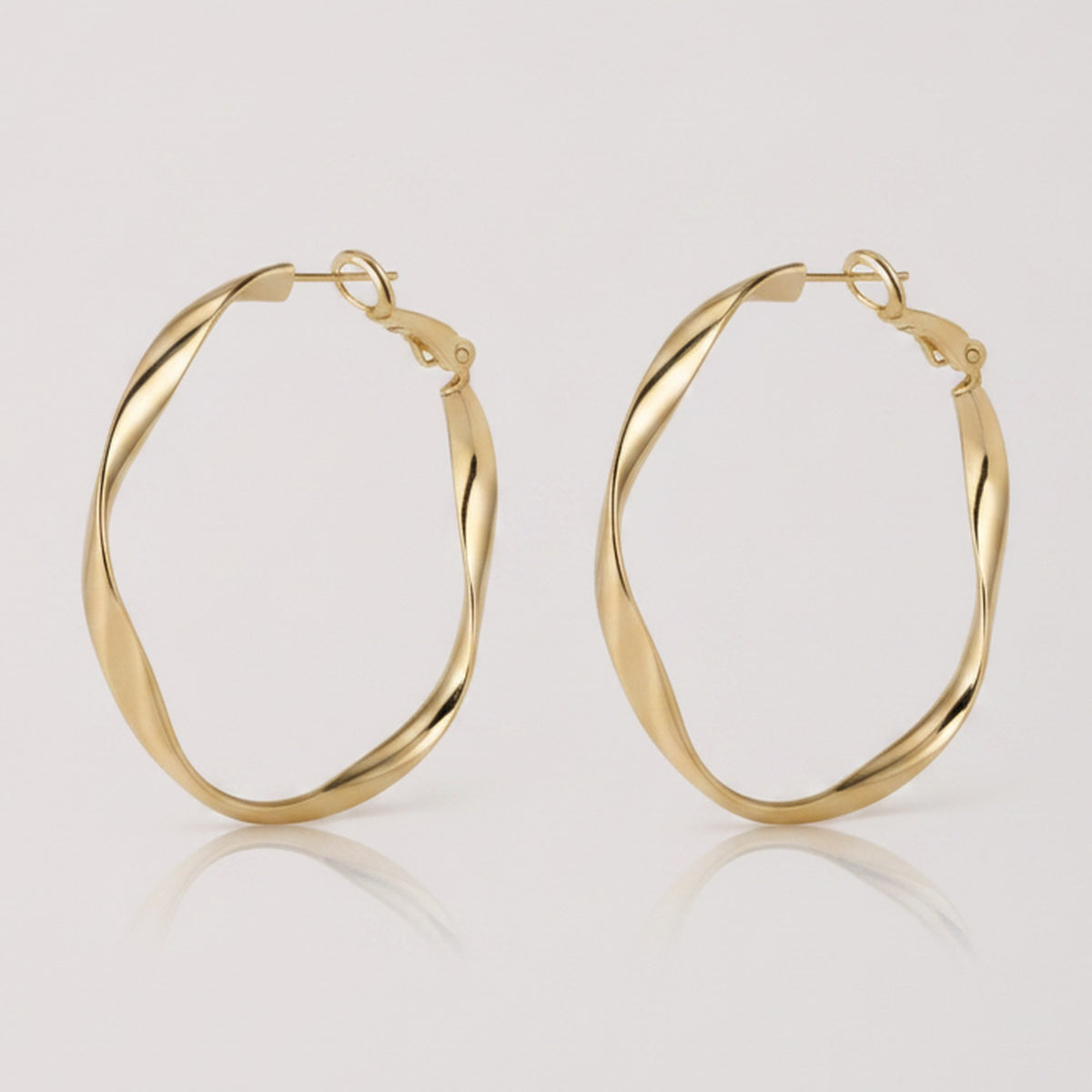 Twisted Oval Hoop Earrings - Gold
