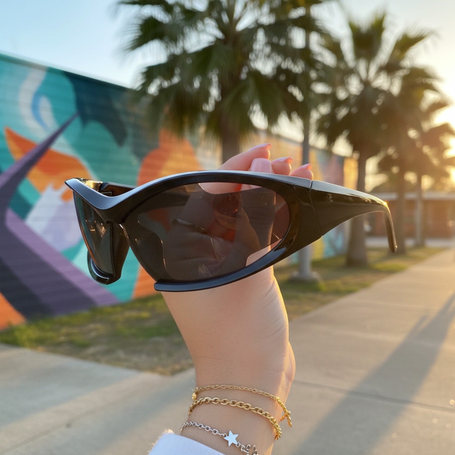 Black Oval Sport Sunglasses With Curved Lens