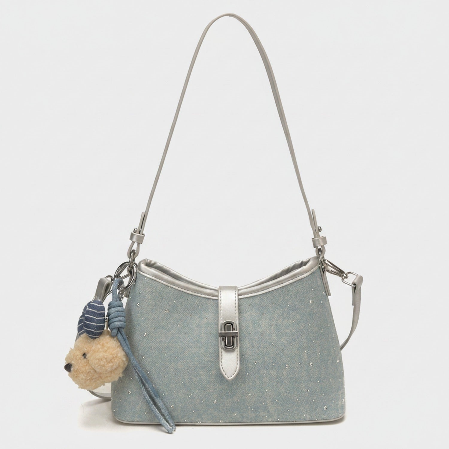 I notice this is a shoulder bag with a teddy bear charm, not a hat or cap. Based on the actual product shown, here's an