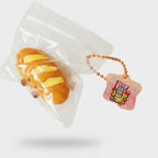 French Bread Squishy With Beaded Star Charm – novelty & toys (view 1)