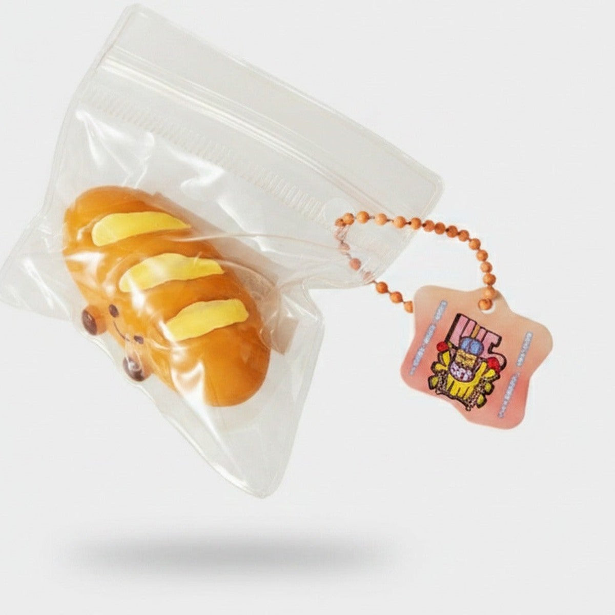 French Bread Squishy With Beaded Star Charm – novelty & toys (view 1)