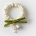 Cream Velvet Scrunchie With Green Bow And Pearl Charm – hair accessories