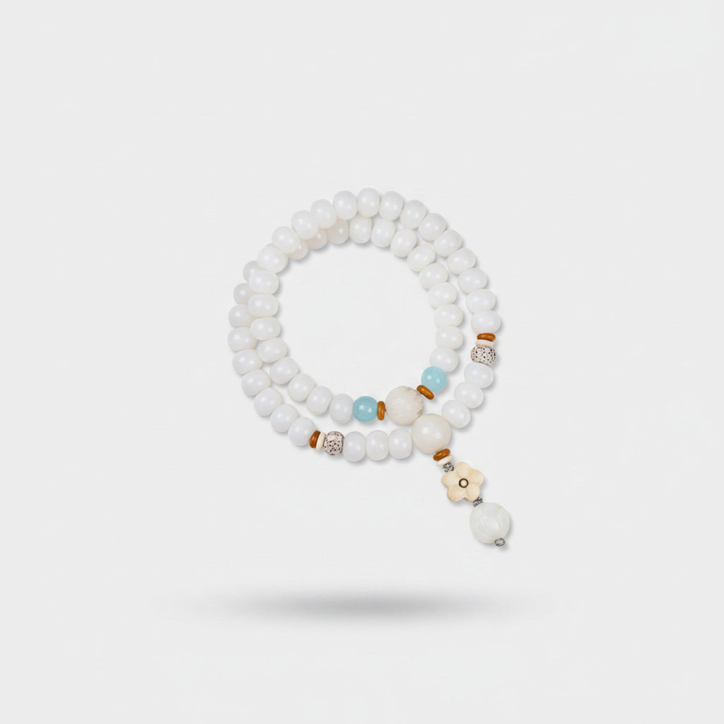 White Beaded Bracelet With Aqua Charm