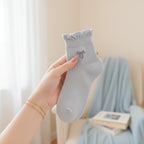 Cream Ribbed Ruffle Bow Socks