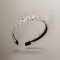 White Speckled Padded Headband With Black Trim