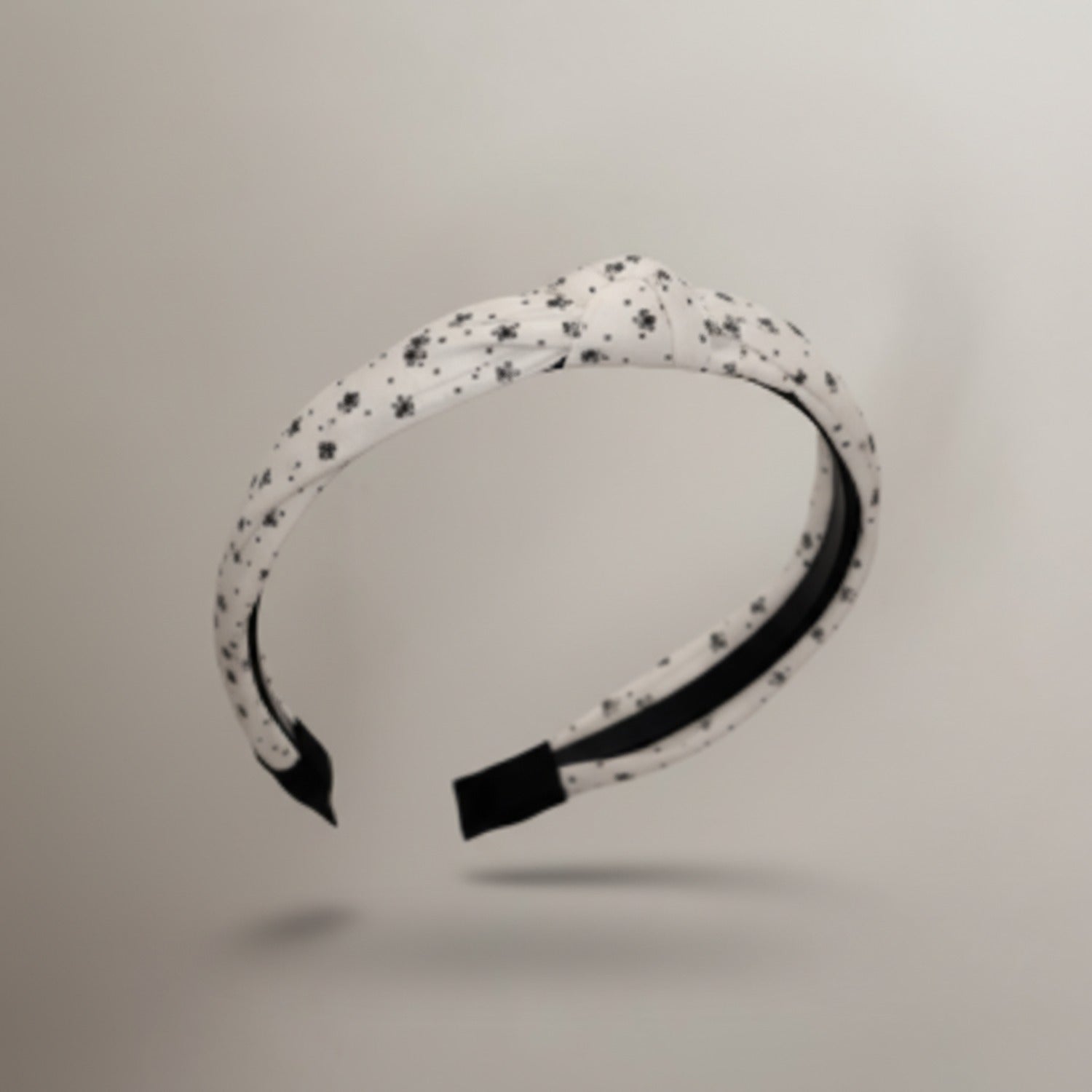 White Speckled Padded Headband With Black Trim