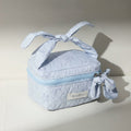 Quilted Light Blue Cosmetic Bag With Bow Charm