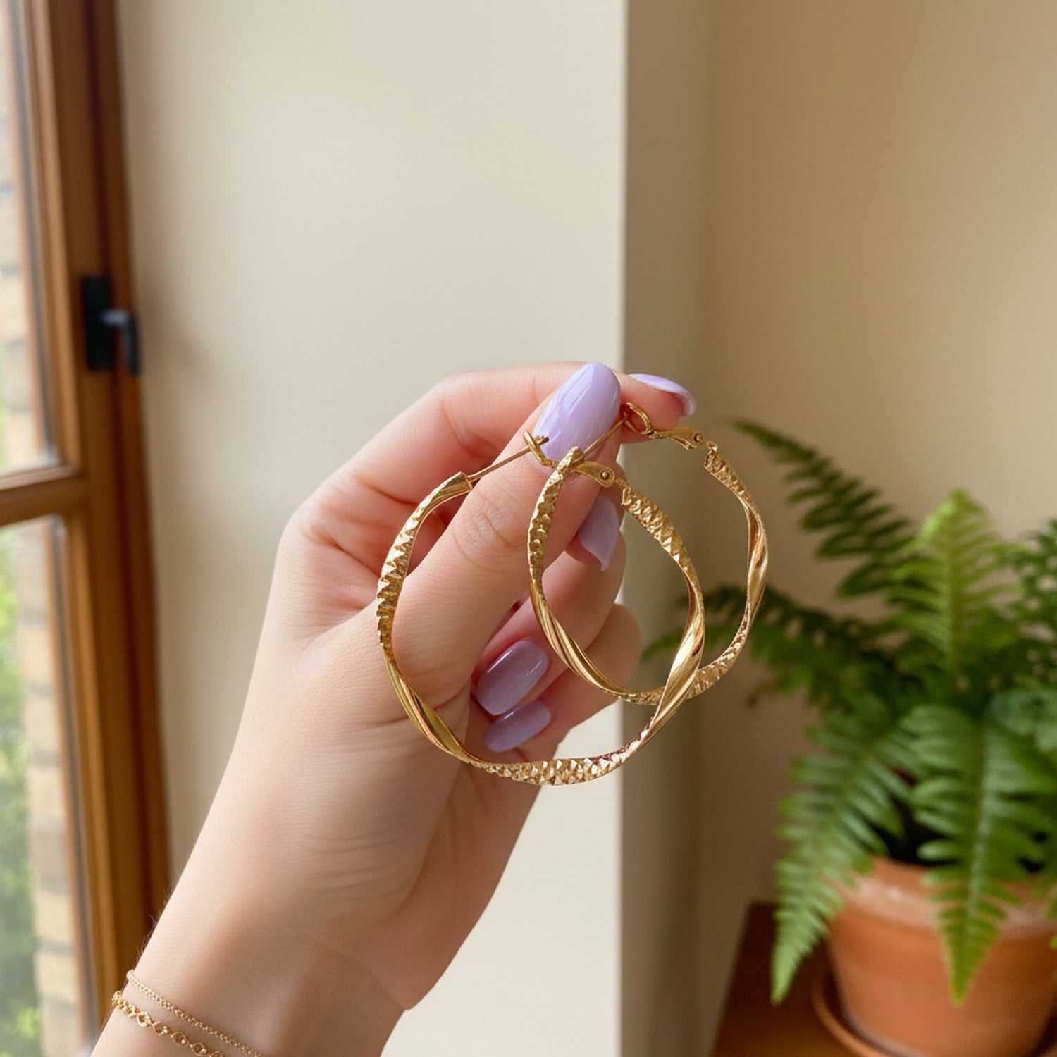 Gold Textured Oval Hoop Earrings