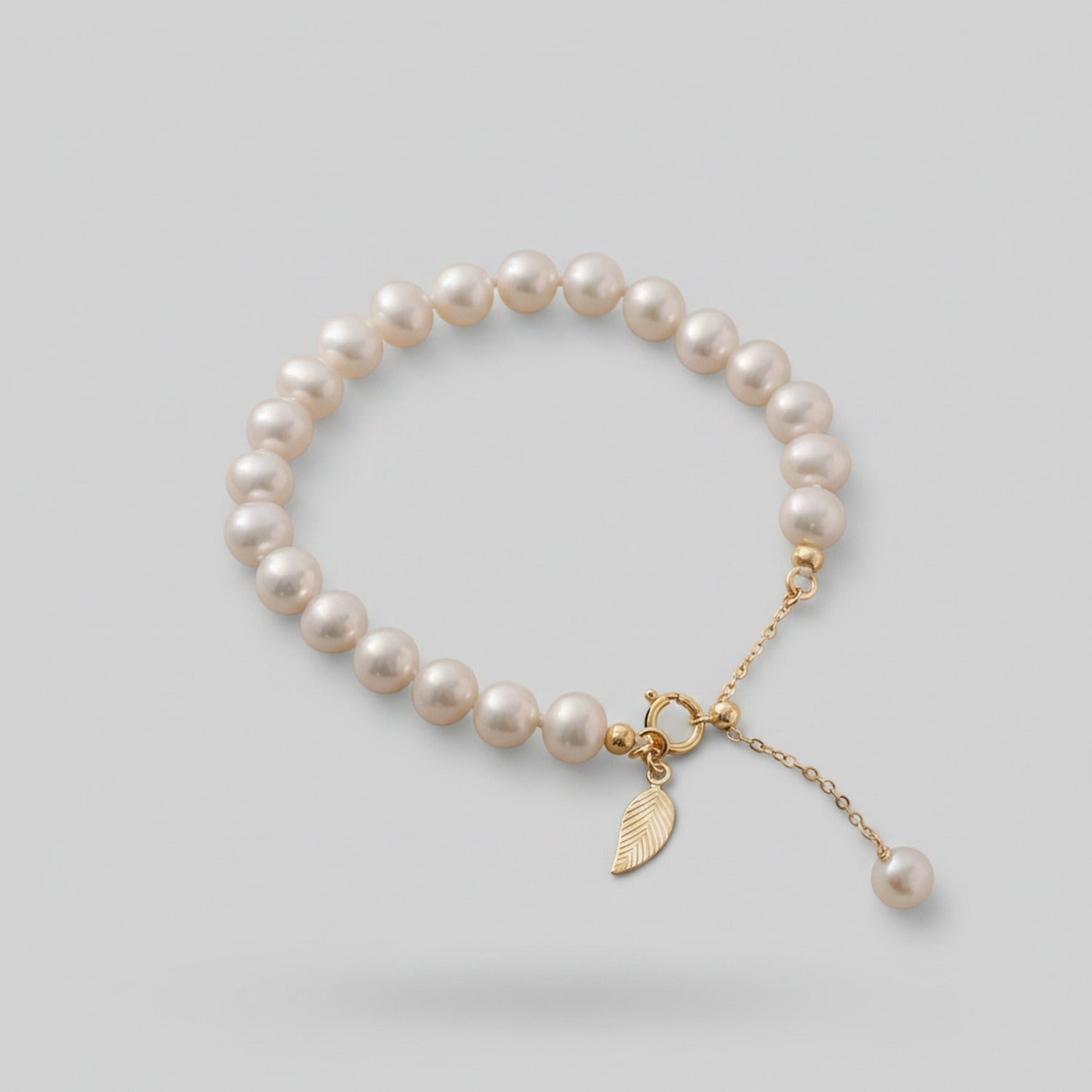 Pearl Beaded Bracelet With Gold Leaf Charm