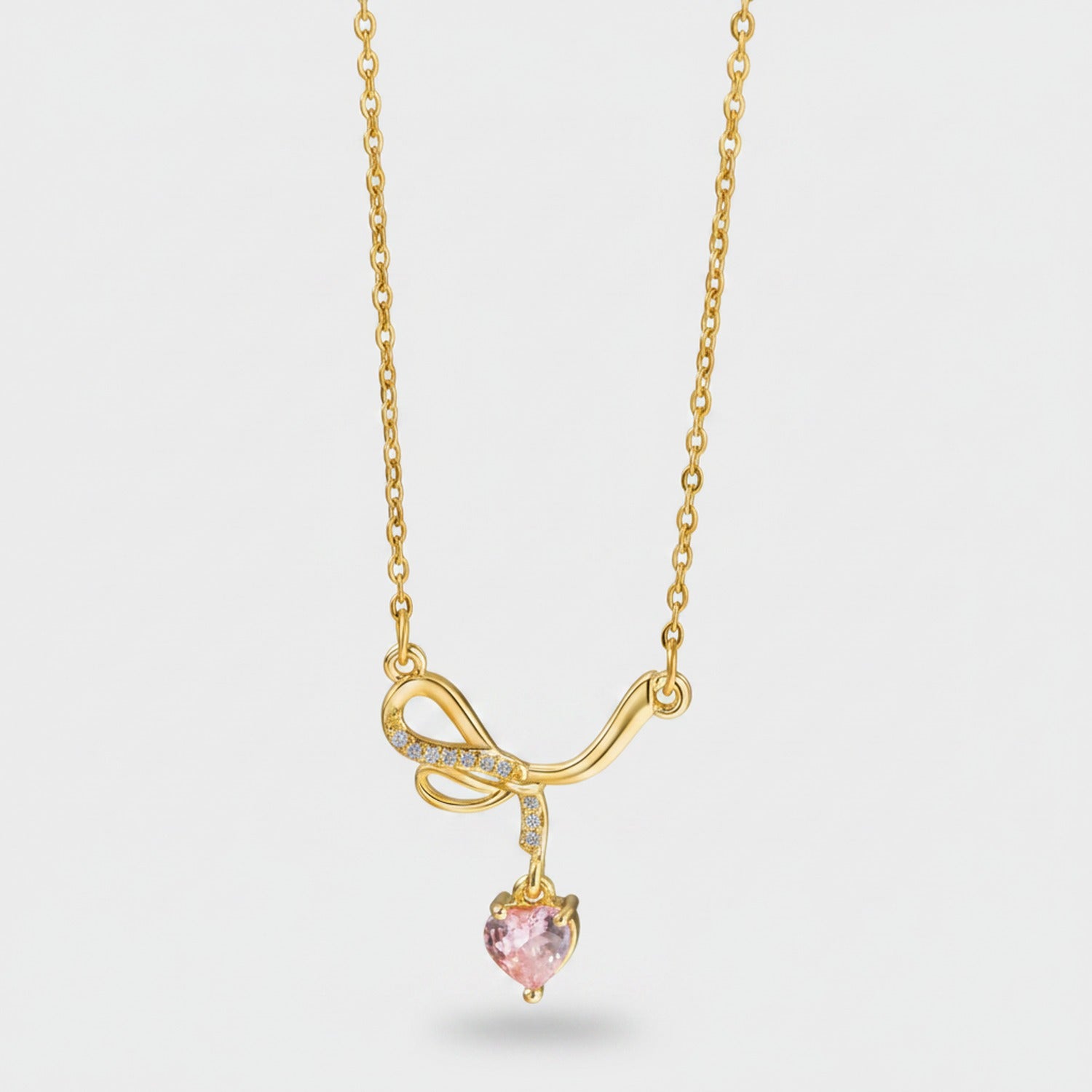 Gold Heart Pendant Necklace With Rhinestone Bow