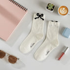 Cream Knit Crew Socks With Black Bow