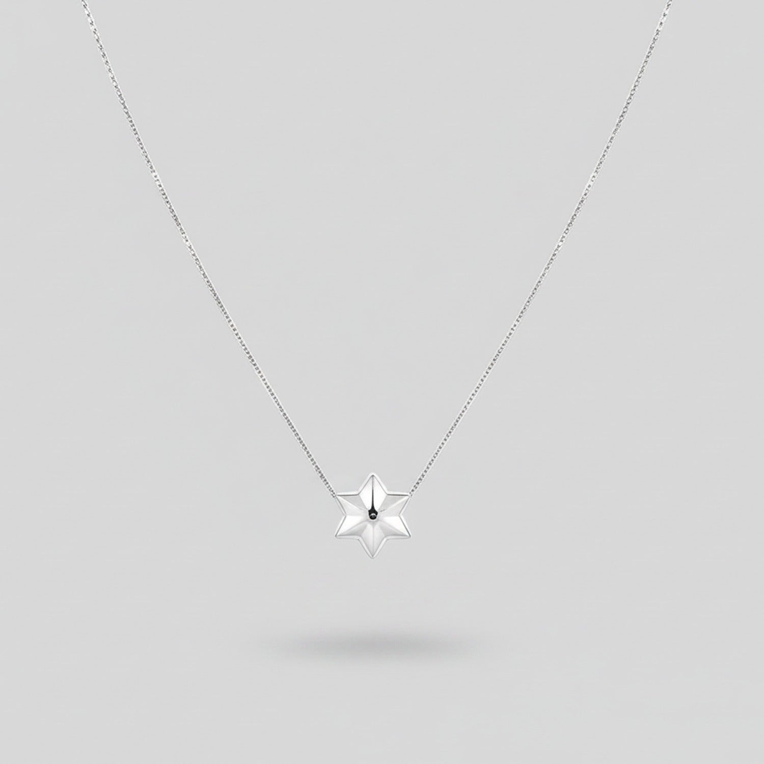 Silver Four-Point Star Pendant Necklace