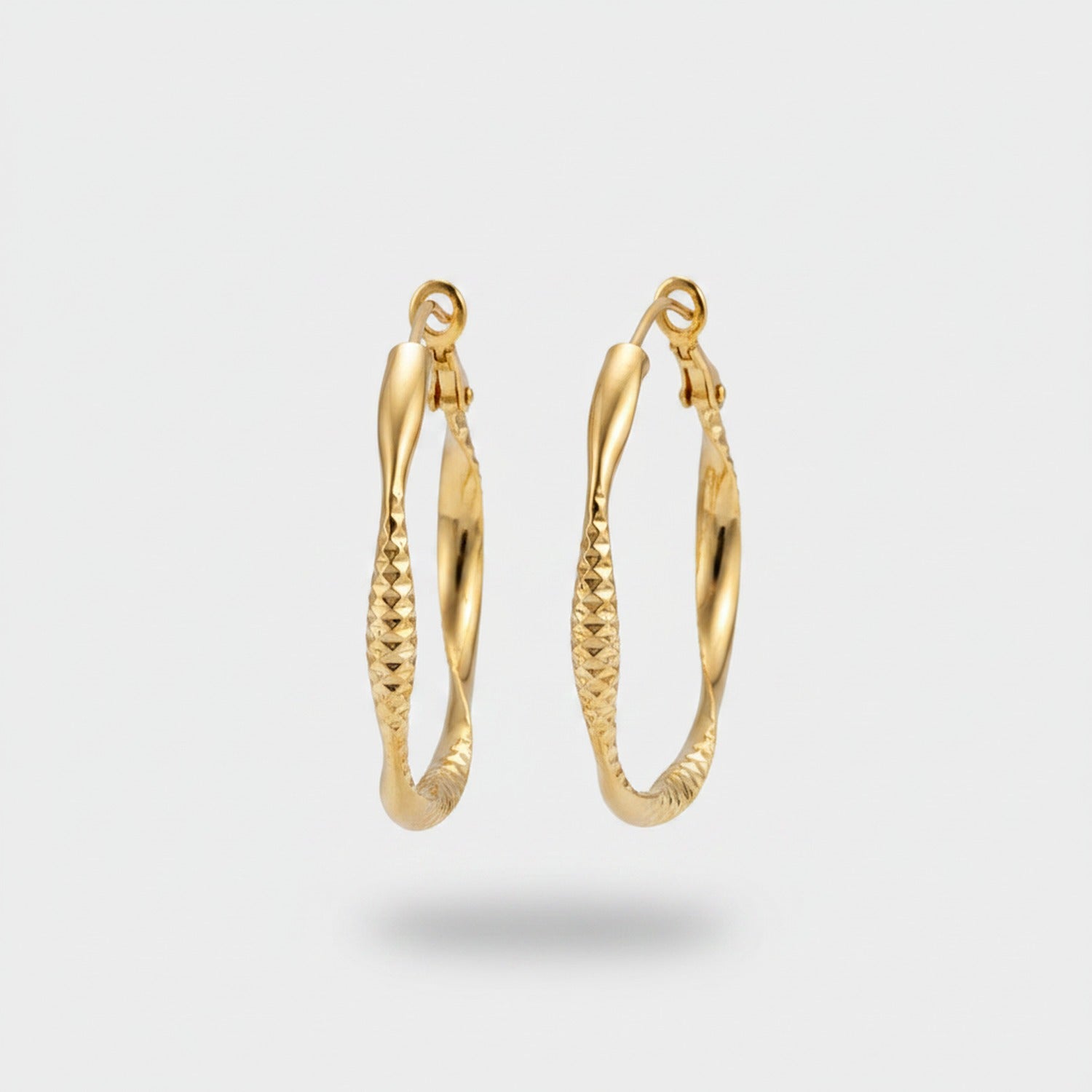 Gold Textured Oval Hoop Earrings