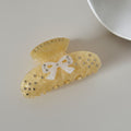 Gold Sparkle Hair Claw With White Bow