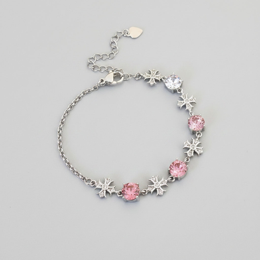 Silver Snowflake Charm Bracelet With Pink Crystals