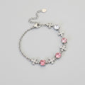 Silver Snowflake Charm Bracelet With Pink Crystals