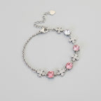 Silver Snowflake Charm Bracelet With Pink Crystals