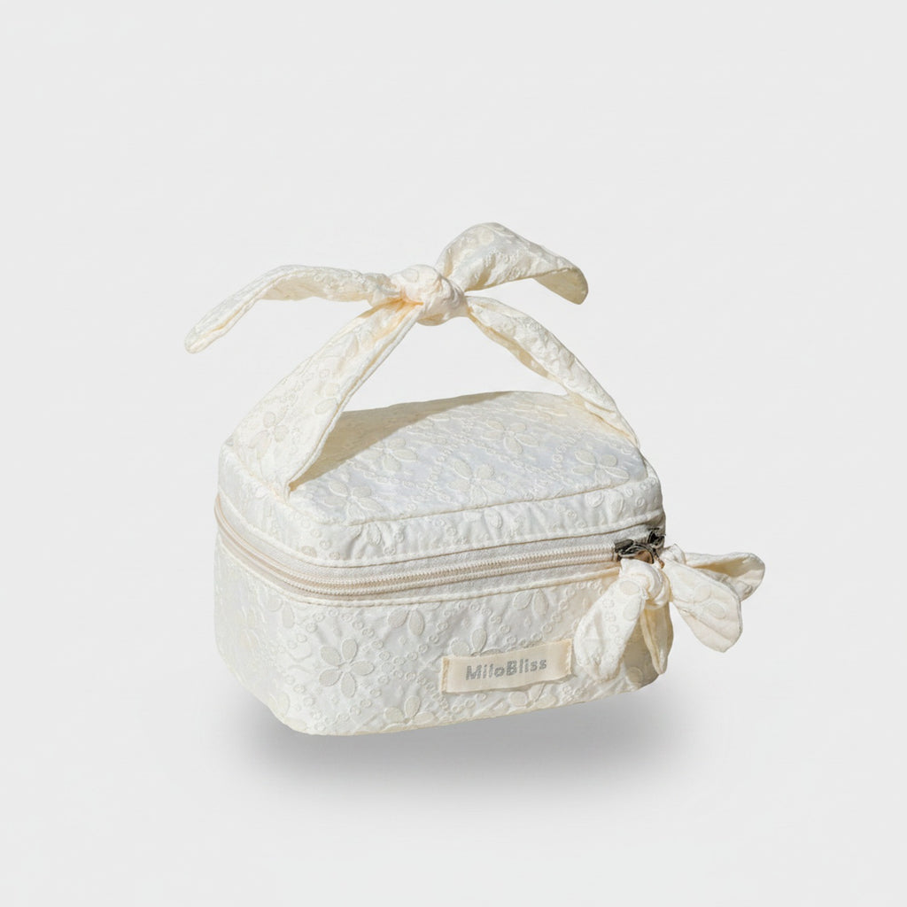 Quilted Cream Cosmetic Bag With Bow Handles