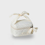 Quilted Cream Cosmetic Bag With Bow Handles