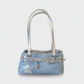 I appreciate the detailed request, but I need to clarify: the image shows a **shoulder bag/handbag**, not a hat or cap.