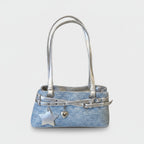 I appreciate the detailed request, but I need to clarify: the image shows a **shoulder bag/handbag**, not a hat or cap.