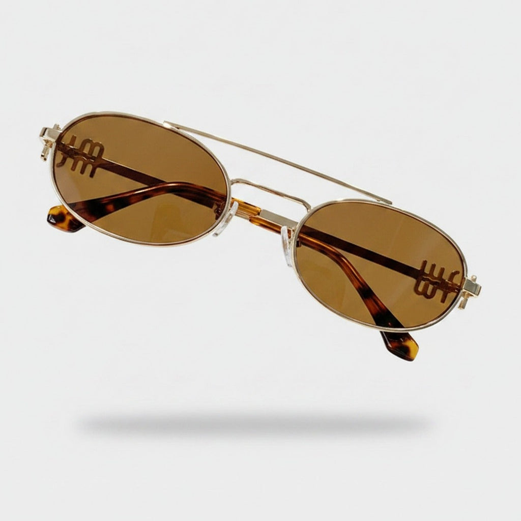 Oval Sunglasses With Geometric Temple Details - Gold Frame Tea Lens – eyewear (view 1)