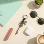Vintage Brass Key Charm Keyring With Celestial Pendant