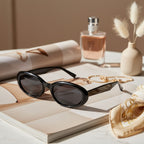 Black Oval Sunglasses with Dark Tinted Lenses