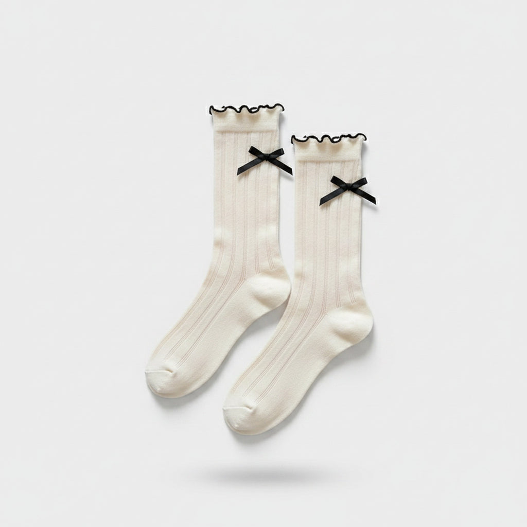 Cream Ribbed Knee High Socks With Black Bows