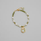 Pearl And Green Gemstone Charm Bracelet
