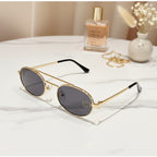 Gold Oval Sunglasses With Geometric Temple Details