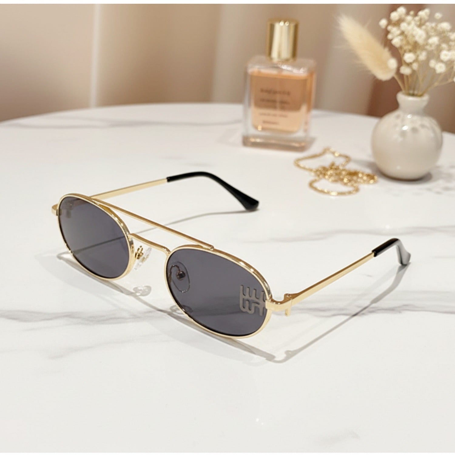 Gold Oval Sunglasses With Geometric Temple Details