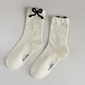 Cream Knit Crew Socks With Black Bow