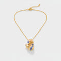 Gold Charm Necklace with Blue Accents