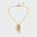 Gold Charm Necklace with Blue Accents