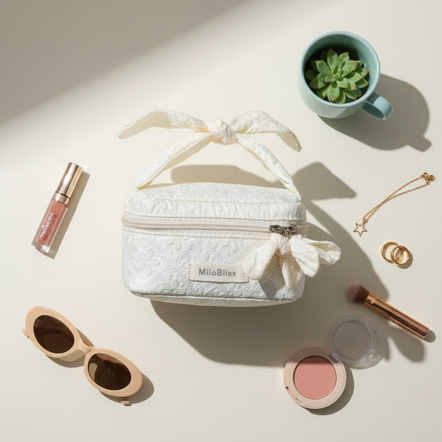 Quilted Cream Cosmetic Bag With Bow Handles