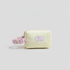 Quilted Cream Cosmetic Bag With Pink Scrunchie