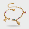 Gold Beaded Charm Bracelet With Sea Life Pendants